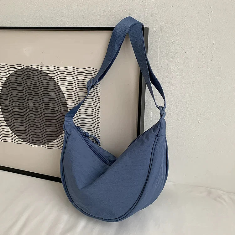 Koozy | Modische Dumpling-Tasche für jedes Outfit