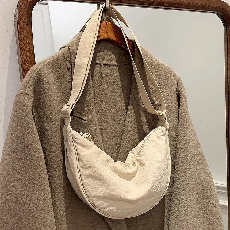 Koozy | Modische Dumpling-Tasche für jedes Outfit